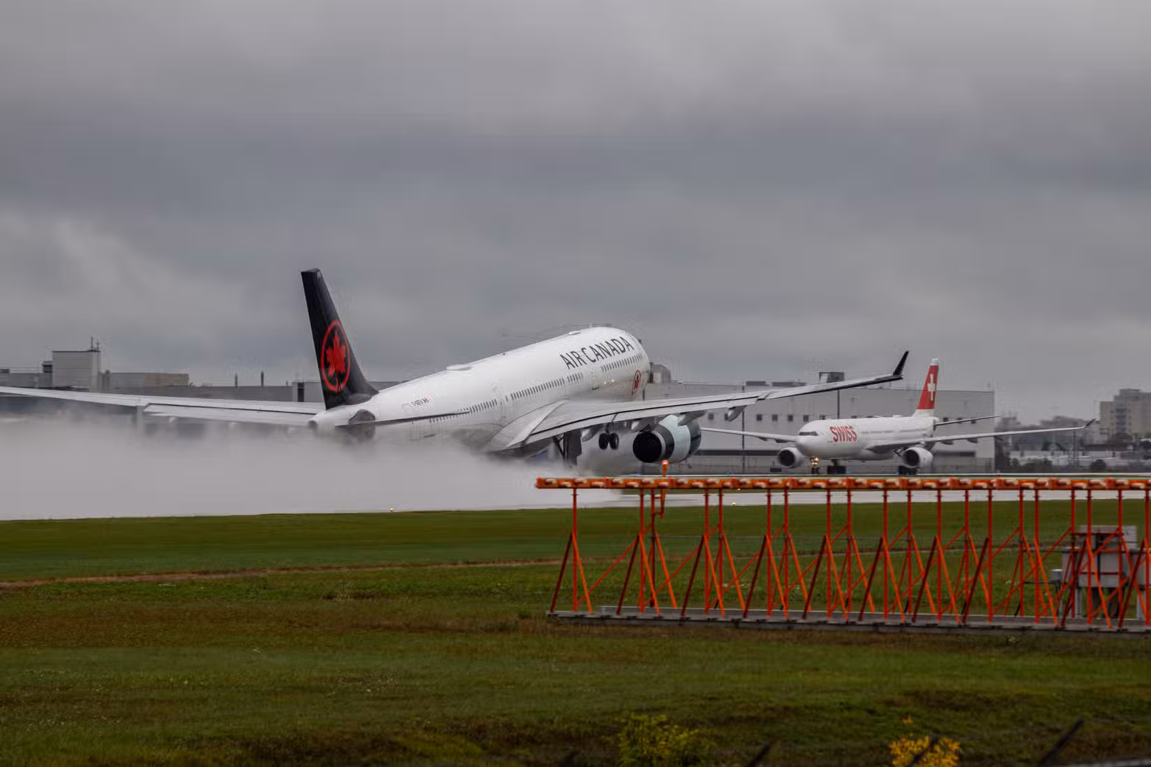 Montreal, Quebec, Canada 10-02-2021: Air Canada Airbus A330-300 taking off from Montreal on a rainy afternoon. Registration C-GEFA, FIN 939.