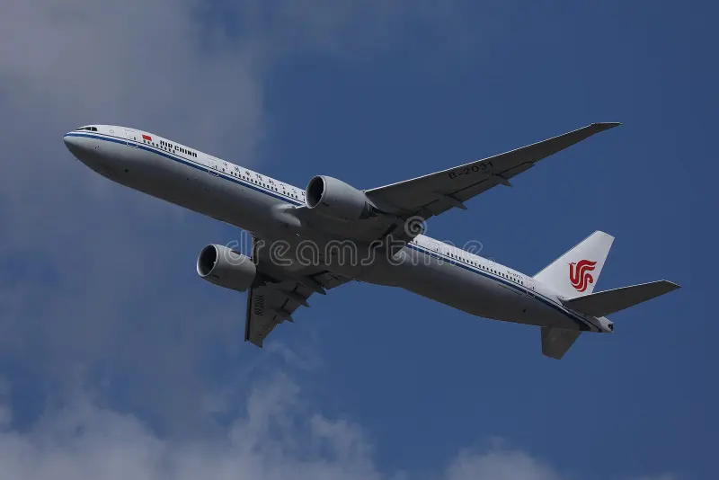 Air China aircraft flying up in the sky. Air China plane took off from Frankfurt Germany FRA royalty free stock image