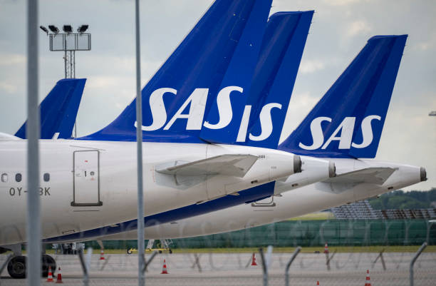 Scandinavian airline SAS aircraft of the type Airbus A321 and A320 Neo are parked at Kastrup airport on July 4, 202 after the 900 pilots at SAS went...