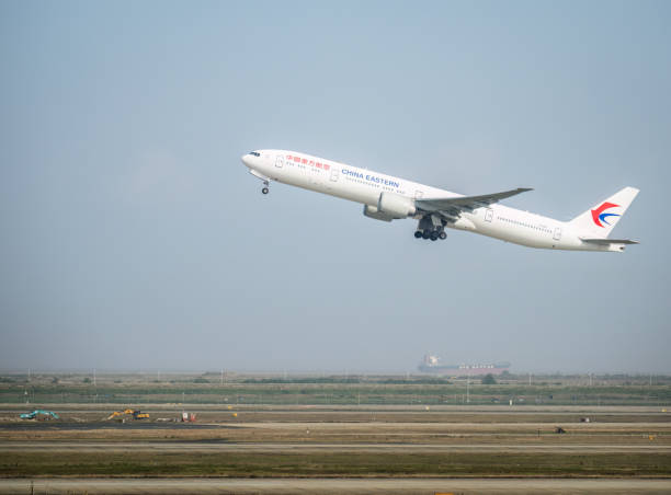 China Eastern Airlines Boeing 777 airplane taking off from Shanghai Pudong International Airport. Shanghai, China - November 04 2024: China Eastern Airlines Boeing 777 airplane taking off from Shanghai Pudong International Airport. china eastern airlines stock pictures, royalty-free photos & images