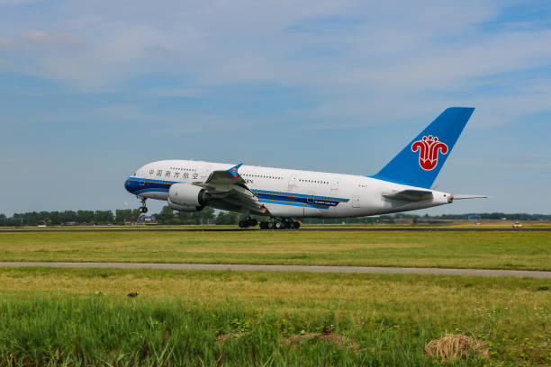 China Southern Airlines Airbus A380-800 aircraft with registration B-6137 takeoff in Amsterdam Schiphol AMS EHAM International Airport in The...