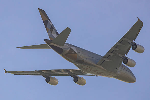 Etihad Airways Airbus A380 double decker passenger aircraft spotted flying after take off from Zayed International Airport AUH of Abu Dhabi, UAE. The...