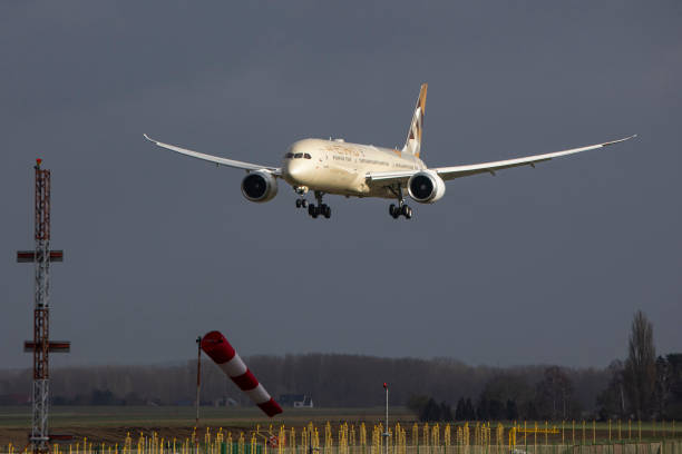 Etihad Airways Boeing 787-9 Dreamliner aircraft as seen on final approach flying, landing and taxiing at the Belgian capital, Brussels Airport...