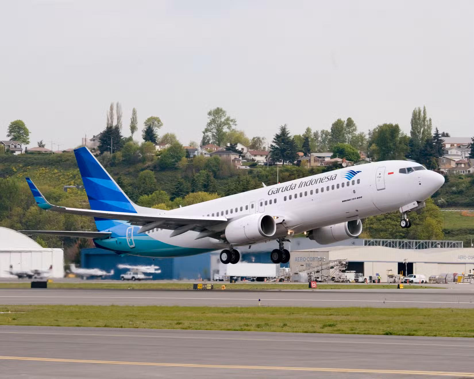 A Garuda Indonesia Boeing 737 taking off.