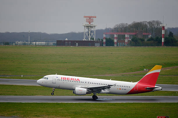 An Airbus A320 From Iberia flying from Madrid lands in Zaventem Airport on March 26, 2025 in Zaventem, Belgium. Iberia Líneas Aéreas de España, S.A....