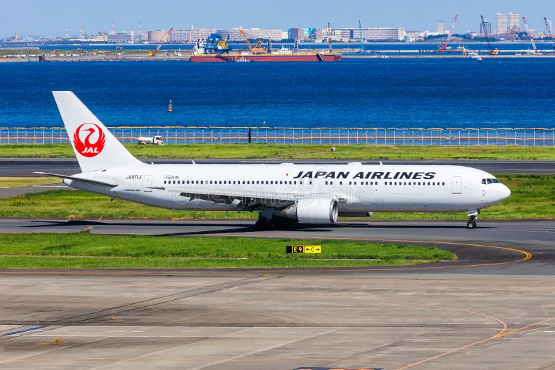 Japan Airlines JAL Boeing 767-300ER airplane at Tokyo Haneda Airport in Japan royalty free stock photography