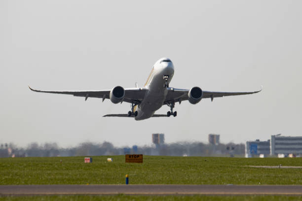 Singapore Airlines Airbus A350-900 aircraft as seen departing and flying from the runway from Amsterdam Schiphol AMS EHAM international airport...