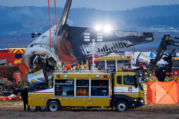 The wreckage of Jeju Air Co. Flight 2216 at Muan International Airport in Muan County, South Korea, on Sunday, Dec. 29, 2024. A Boeing Co. 737-800...