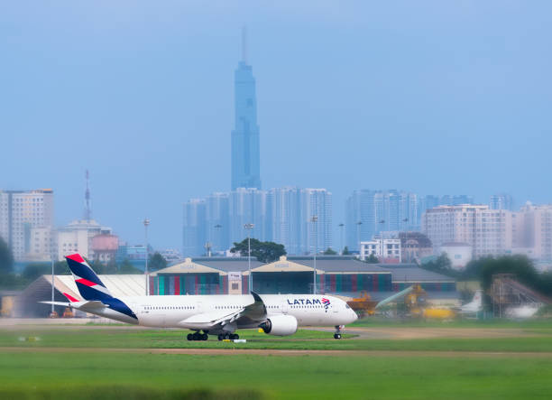 Aircraft airbus a350 of LATAM Airlines prepare take off from Tan Son Nhat International Airport Ho Chi Minh City, Vietnam - September 1st, 2019: Aircraft airbus a350 of LATAM Airlines prepare take off from Tan Son Nhat International Airport, Ho Chi Minh City, Vietnam. latam airlines stock pictures, royalty-free photos & images