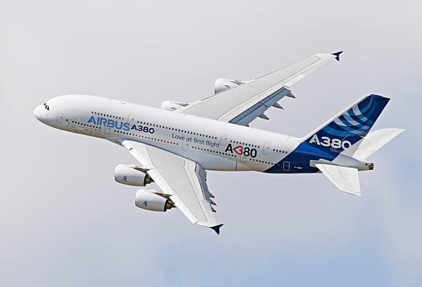 flying airbus a380 - airbus stock pictures, royalty-free photos & images