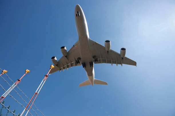 airbus a380 in flight - airbus a380 lufthansa stock pictures, royalty-free photos & images