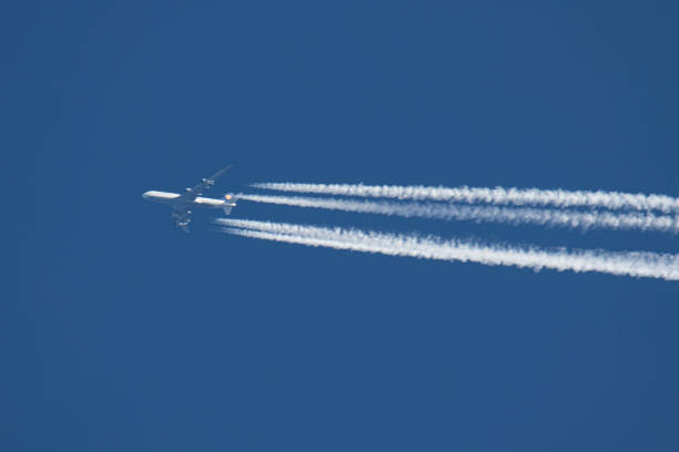Lufthansa Boeing 747-8 aircraft spotted flying at 34.000 feet in the blue sky, performing a flight from Frankfurt FRA airport in Germany to Chicago...