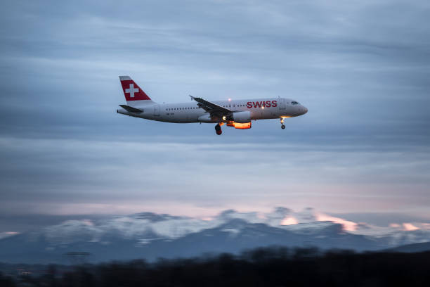 This photograph taken on January 23 shows an Airbus A320-214 commercial plane of Swiss International Air Lines landing at Geneva Airport with the...