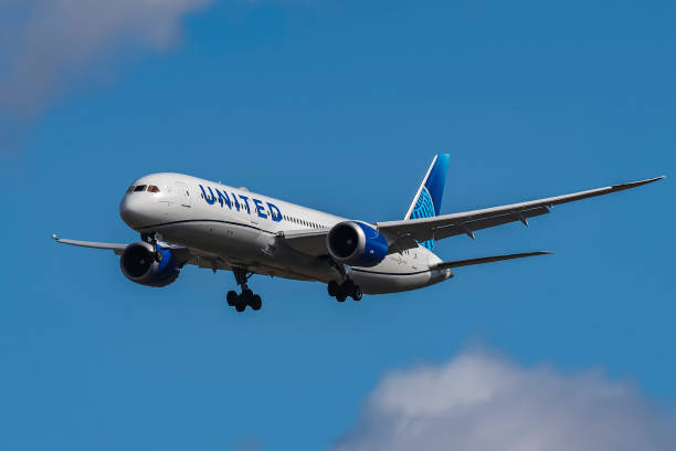 United Airlines Boeing 787-9 Dreamliner aircraft spotted flying on final approach for landing at London Heathrow Airport in the United Kingdom. The...