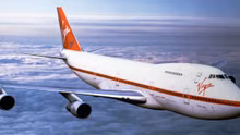 A Virgin Atlantic 747-200 flying above the clouds.