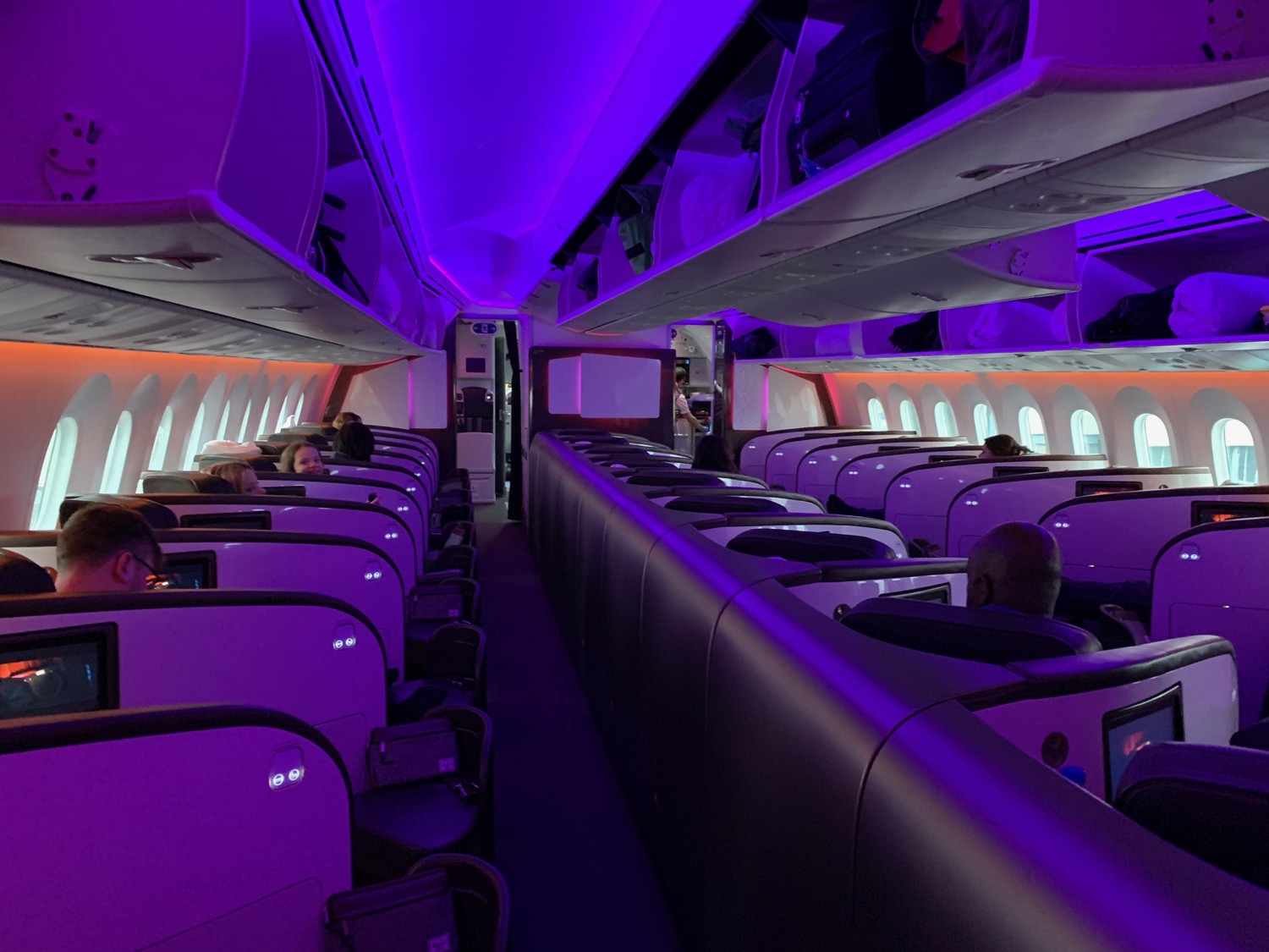inside an airplane with purple lights