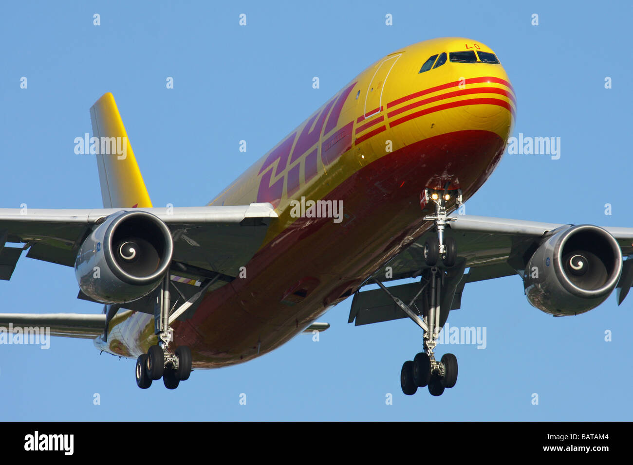 Cargo aircraft - Airbus A300 from DHL company landing on London Heathrow - Stock Image