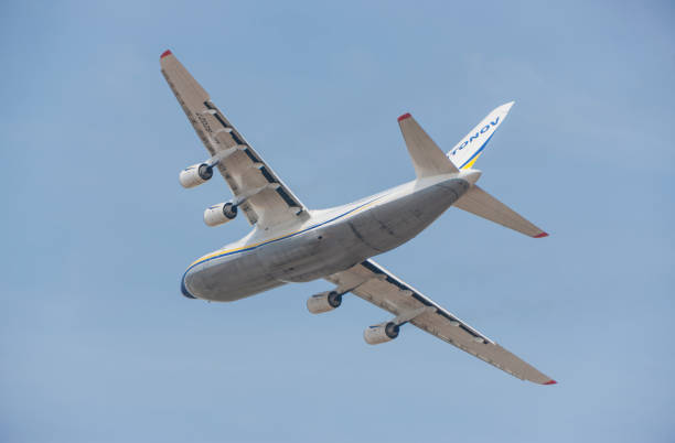 antonov an-124 ruslan heavy transport airplane flying - antonov 124 cargo stock pictures, royalty-free photos & images