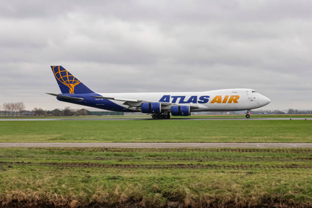 Atlas Air Boeing 747-8F cargo aircraft spotted flying, landing and taxiing at Polderbaan runway in Amsterdam Schiphol AMS EHAM International Airport...