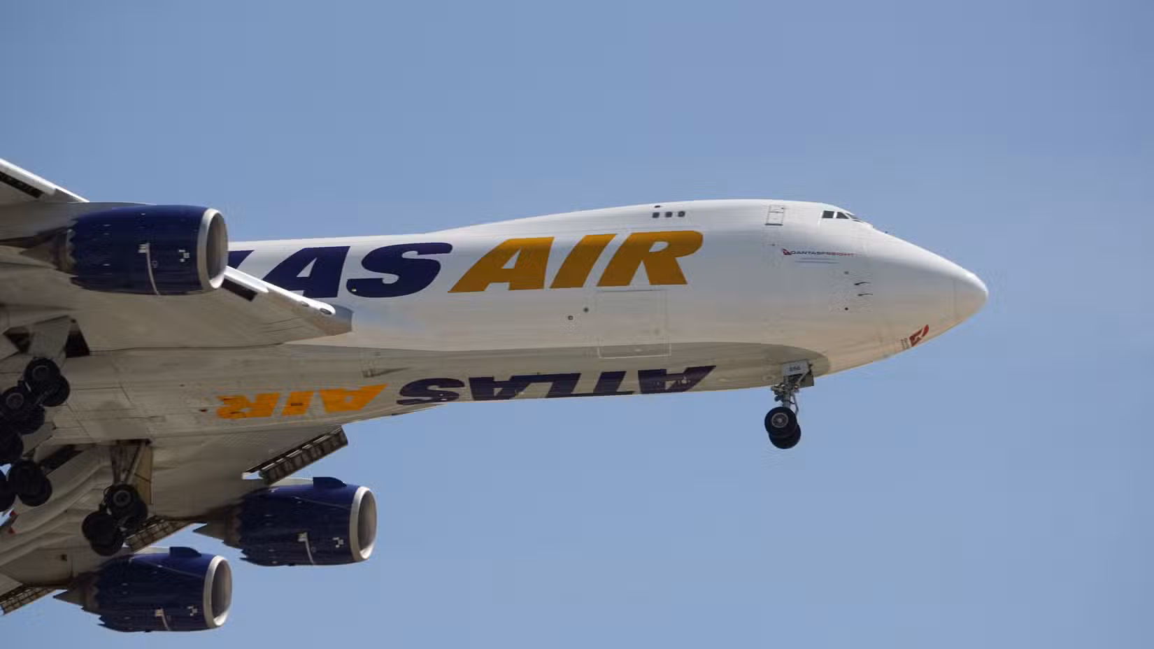 An Atlas Air Boeing 747-8F flying in the sky.
