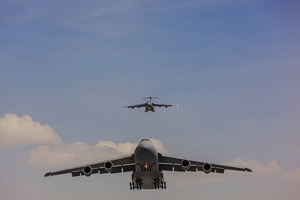C-5 Galaxy Miliytary Aircrafts Kabul, Afghanistan - May 09, 2016: Two US Air Force Lockheed C-5 Galaxy military cargo aircraft in flight. c 5 galaxy stock pictures, royalty-free photos & images