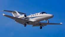 A Cessna Citation M2 Flying In the Sky.