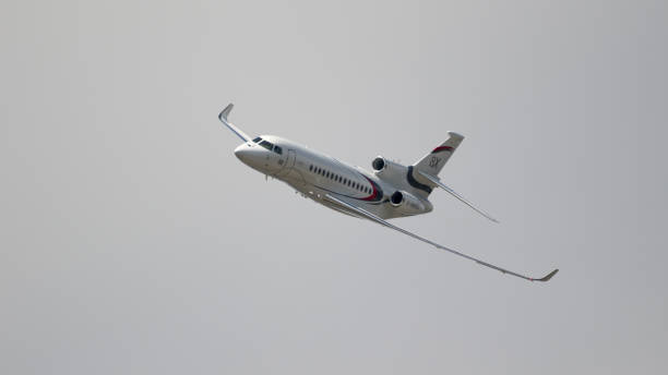 Dassault Falcon 8X business jet PARIS, FRANCE - JUN 23, 2017: New Dassault Falcon 8X business jet flying at the Paris Air Show 2017 falcon jet dassault stock pictures, royalty-free photos & images