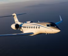 A Gulfstream G650 flying above the clouds.