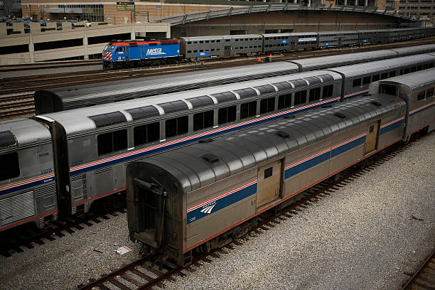Amtrak Superliner passenger trains sit outside Union Station in Chicago, Illinois, U.S., on Wednesday, Oct. 7, 2015. The head of Amtrak warned...