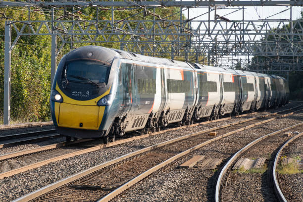 Avanti West Coast Class 390 Pendolino Train Rugeley Staffordshire - Avanti West Coast Class 390 Pendolino Train travelling on the West Coast Mainline. pendolino train stock pictures, royalty-free photos & images