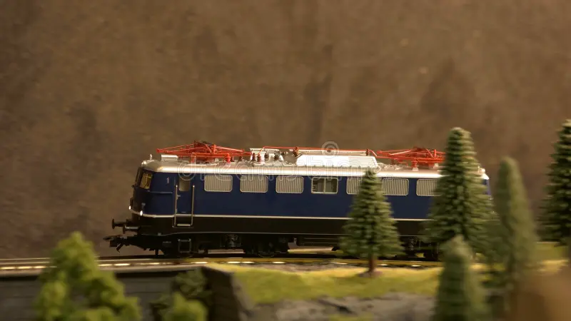 Side view train carriage on the railroad. Miniature train model with trees. Diesel locomotive side view stock images, royalty-free photos and pictures