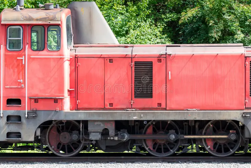 Close up side view of old diesel shunting locomotive with rod drive as concept for ancient technology on railroads. Diesel locomotive side view stock images, royalty-free photos and pictures
