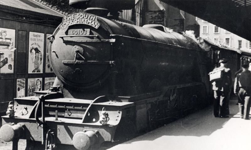 Image 1 of B/W print; Three quarter front nearside view of steam locomotive no 60103 "Flying Scotsman" at Marylebone with headboard for "The South Yorkshireman" train service, c1948-1960