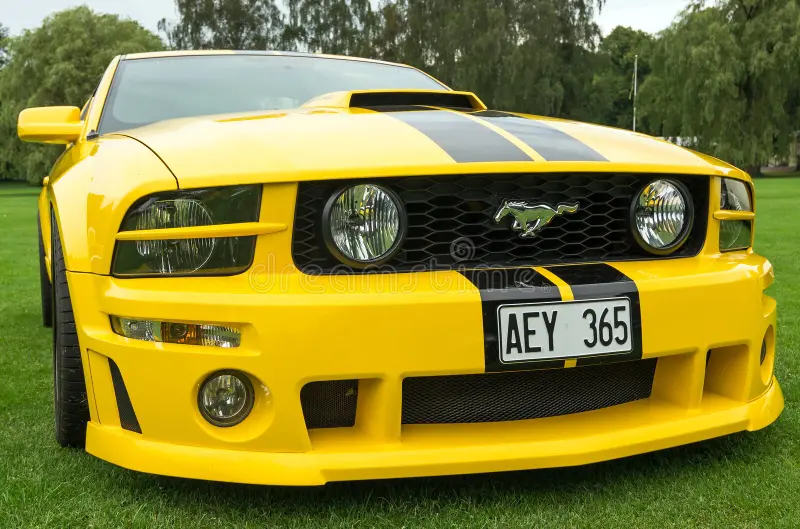 RONNEBY, SWEDEN - AUGUST 09: Summer V8 car fans event Pony & muscle car meet. Front view of Ford Mustang model 2005 in 08 August, 2014 in Ronneby, Sweden. Ford mustang side view stock images, royalty-free photos and pictures