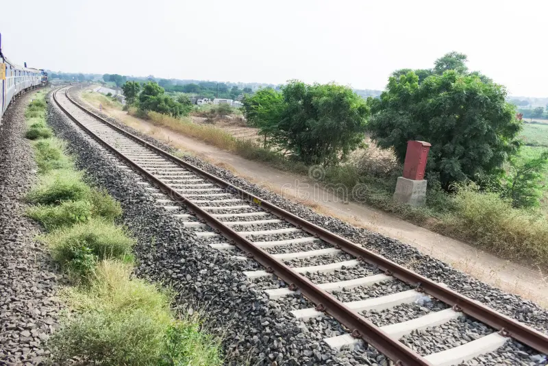 This snap has taken in running train with train a side view & a railway track. Side view freight train stock images, royalty-free photos and pictures