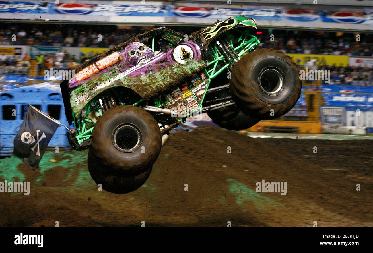 Charlie Pauken drives his truck Grave Digger at Monster Jam, a monster truck competition, in San Jose, May 2, 2008. REUTERS/Juan Carlos Ulate (COSTA RICA) - Stock Image
