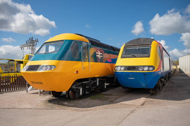 Intercity 125 Class 43 HST Locomotives Crewe, England, UK - Wide angle view of two Class 43 diesel locomotives at Crewe. The British Rail Class 43 (HST) is the classification used for the InterCity 125 High Speed Train power cars, these trains have been in service in the UK since 1976. intercity 125 stock pictures, royalty-free photos & images