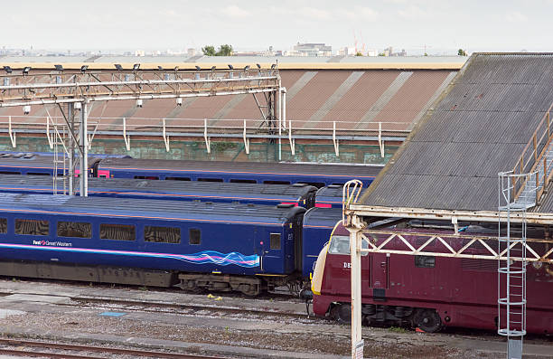 Old Oak Common Train Maintenance Depot London, England - July 10, 2016: First Great Western Intercity 125 High Speed Trains stabled at Old Oak Common Train Maintenance Depot in west London. The 1970s trains are due to be phased out starting 2017 and replaced with new electric Hitachi Intercity Express trains as part of the Great Western Main Line upgrade. intercity 125 stock pictures, royalty-free photos & images