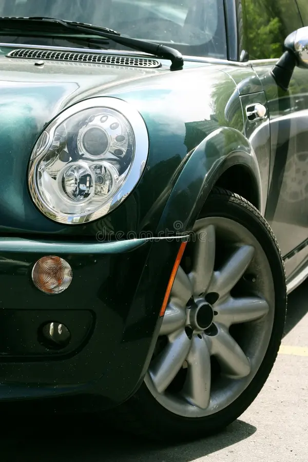 Side view of green car. Mini cooper front view stock images, royalty-free photos and pictures