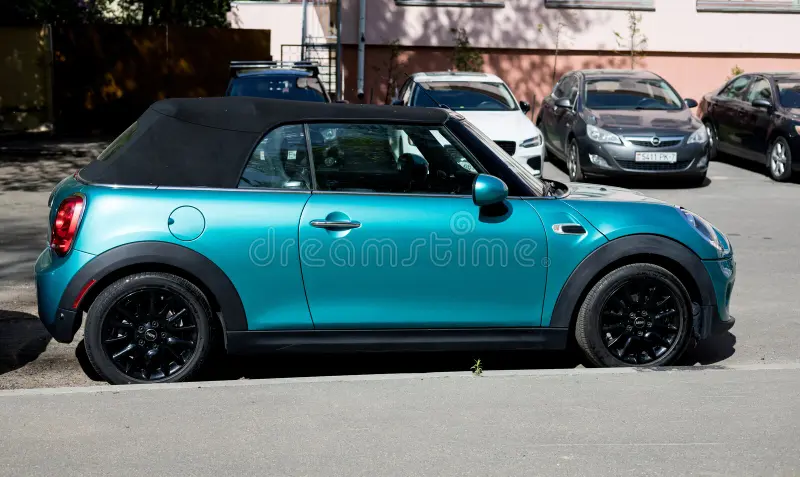 Minsk, Belarus, May 14, 2024 - MINI Cooper side view - urban car. Bmw mini cooper car side view stock images, royalty-free photos and pictures
