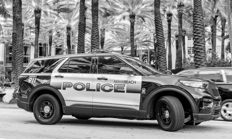 Miami, Florida, USA - November 18, 2024: Police car outside. Emergency 911 service. Emergency vehicle of police 911. Police car Ford Interceptor in Miami, side view. Ford Interceptor. Police interceptor vehicle stock images, royalty-free photos and pictures