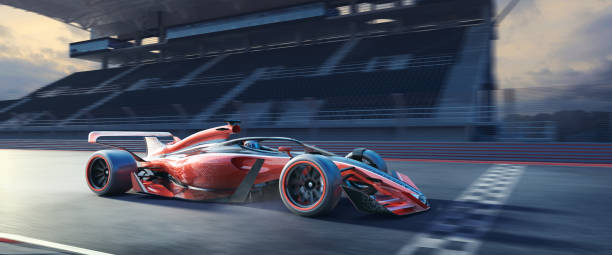 fast moving racing car over racetrack finish line near grandstand - race car side view stock pictures, royalty-free photos & images