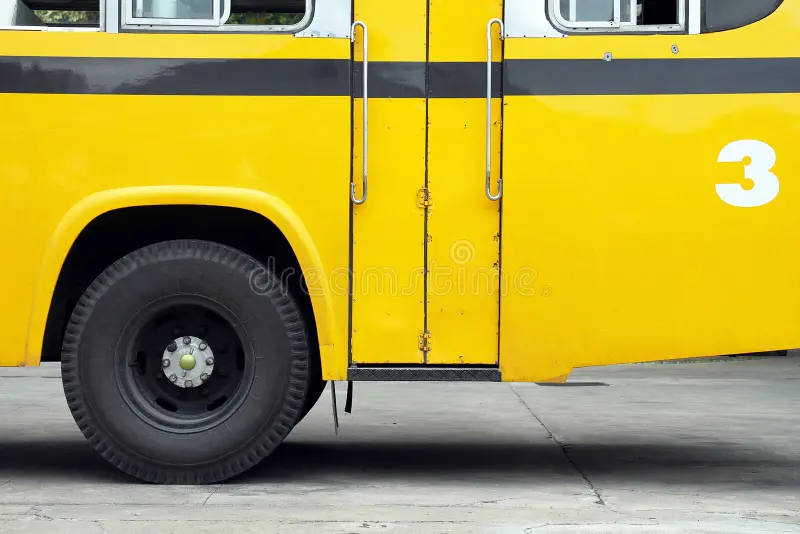 School bus side view, wing with a wheel, yellow bus. School bus side view stock images, royalty-free photos and pictures