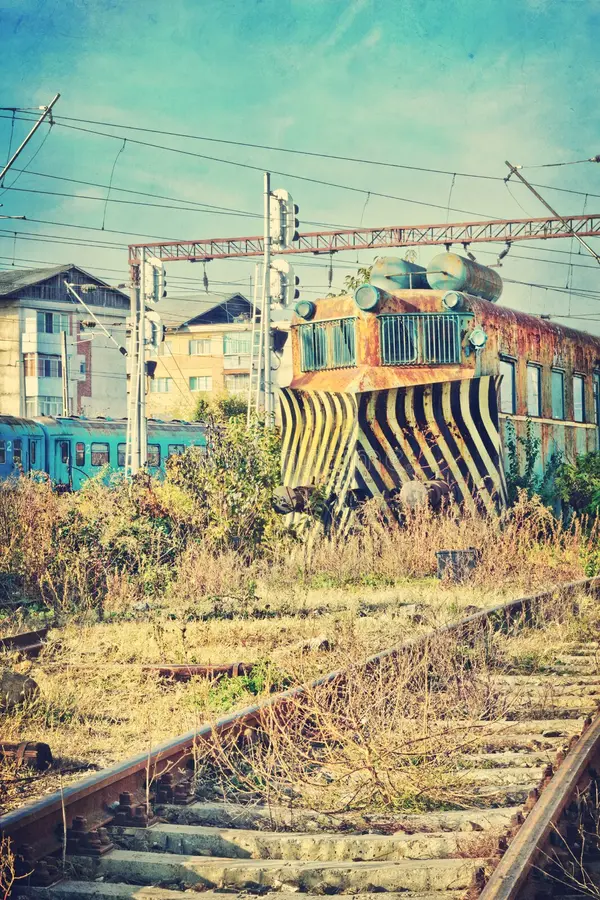 Rusty snowplow locomotive on railroad during summer. Railroad snowplow stock images, royalty-free photos and pictures