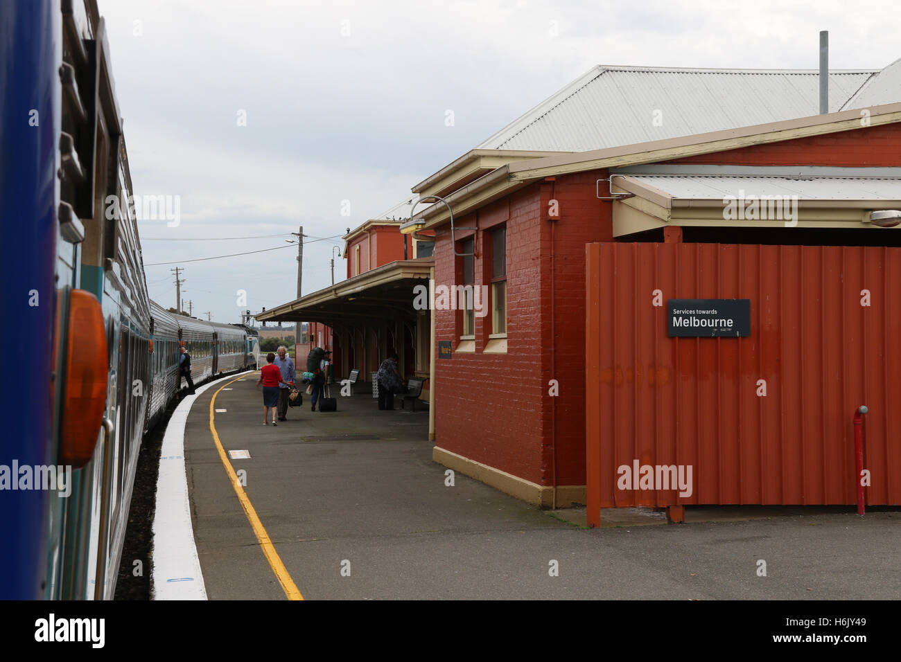 The XPT train, which travels between Sydney and Melbourne in Australia stops at Harden station. - Stock Image