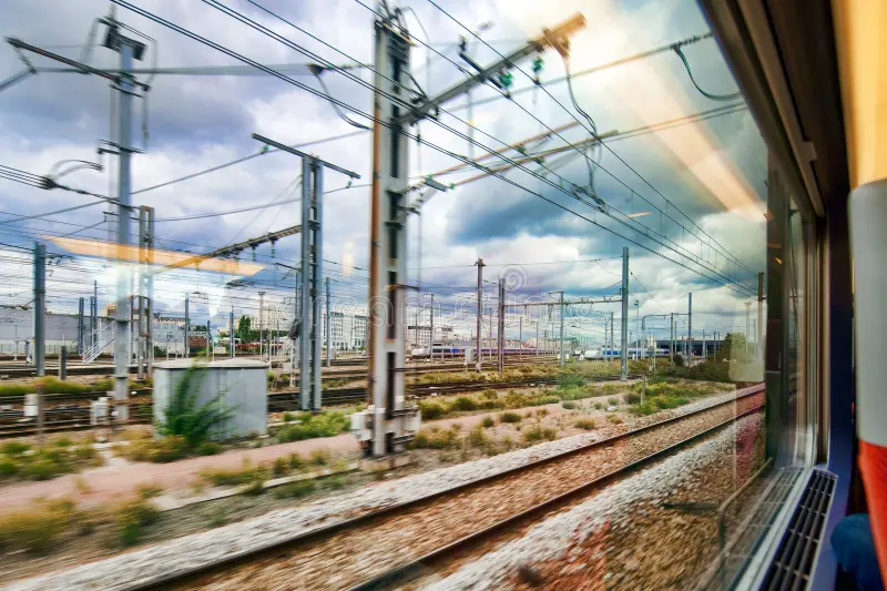 Tgv train window view approaching paris railway tracks and catenary network dynamic from a showing multiple lines on approach to photo stock