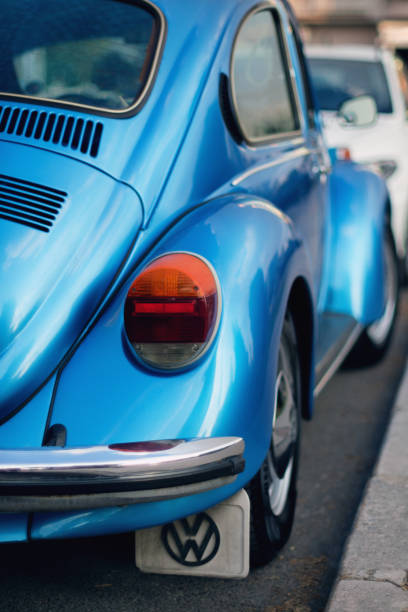 Rear view of Blue colored Volkswagen brand and VW1303 model German product car on the street. Izmir, Turkey - July 6, 2021: Rear view of Blue colored Volkswagen brand and VW1303 model German product car on the street. volkswagen beetle side view stock pictures, royalty-free photos & images