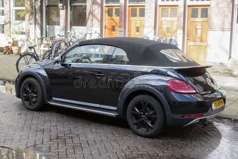 A Black Volkswagen Beetle Car At Amsterdam The Netherlands 30-3-2026. Vw beetle side view stock images, royalty-free photos and pictures